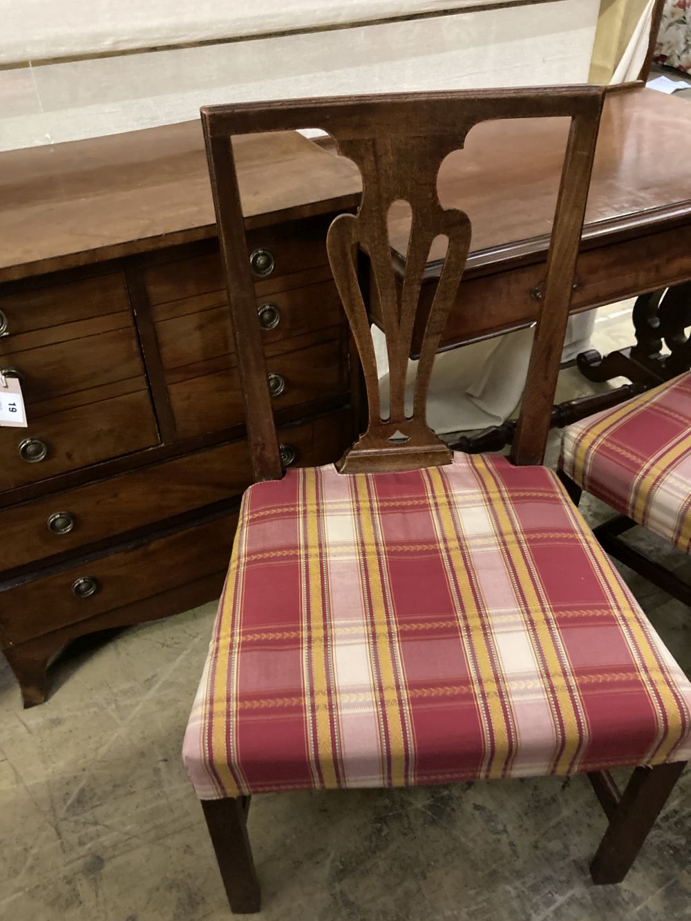 A set of ten George III country Chippendale mahogany dining chairs, W.1ft 7.5in. H.3ft 1.5in.